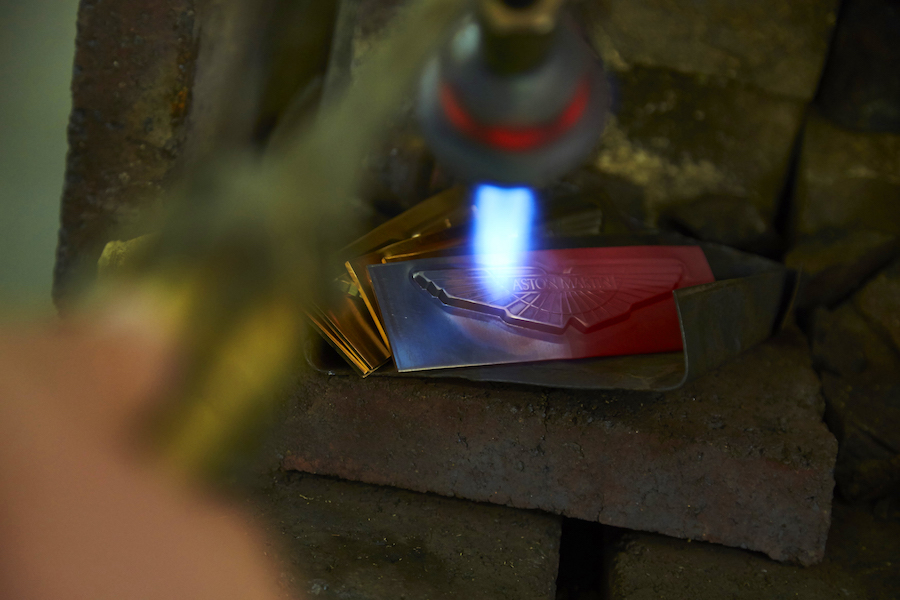 Aston Martins fly multiple national flags