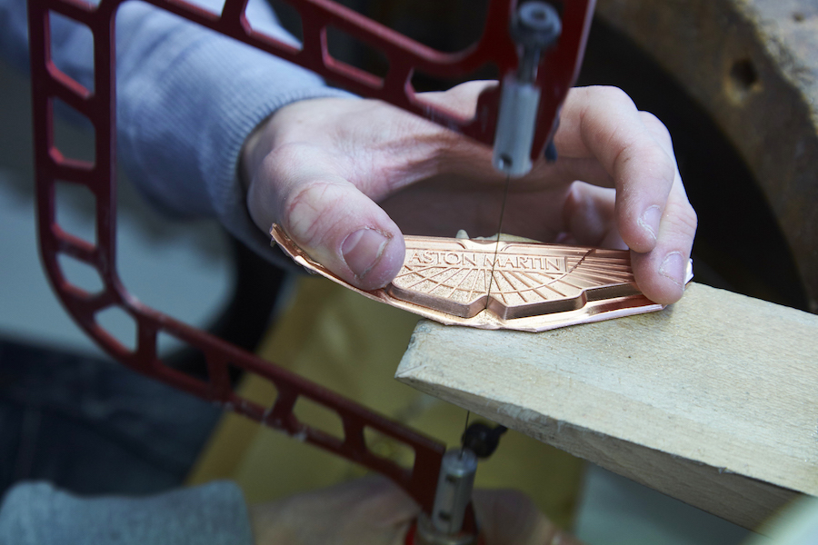 Aston Martins fly multiple national flags