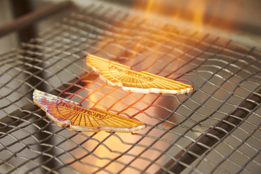 Aston Martins fly multiple national flags