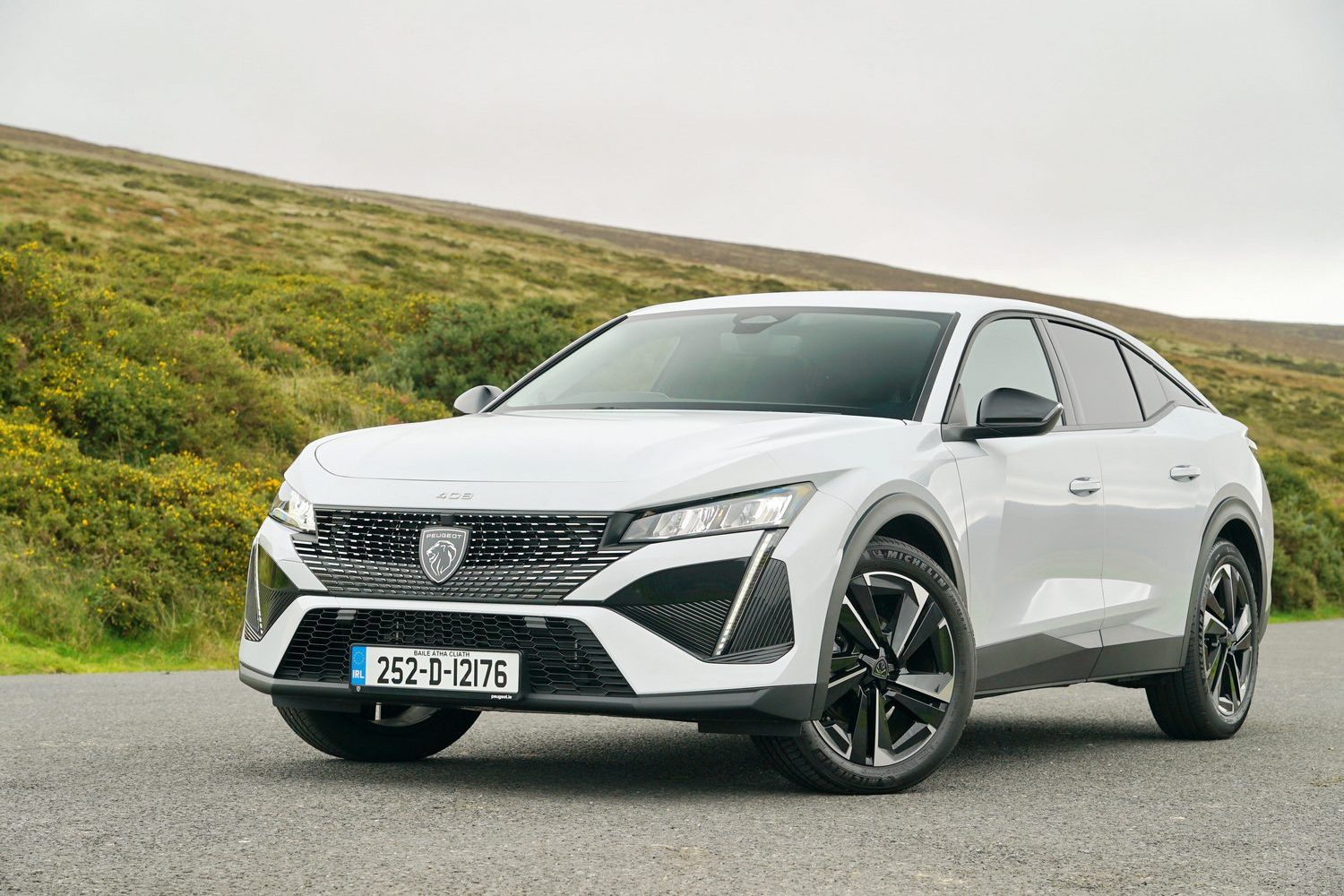 Car Reviews | Peugeot 408 and E-408 (2025) | CompleteCar.ie